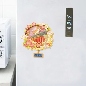Peking University metal fridge magnet featuring a floral wreath and enamel design