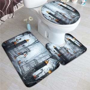 Three-piece Halloween bathroom mat set featuring spooky graveyard and pumpkin print