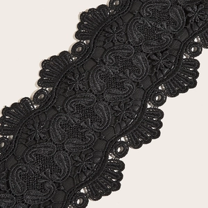 Elastic wide black lace belt for dresses featuring detailed floral cutout patterns
