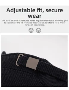Detail of adjustable metal buckle on black winter cap for a secure and windproof fit