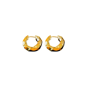 Minimalist gold-plated hoop earrings with unique hammered texture and irregular metal finish