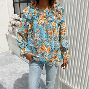 Women's teal floral long sleeve chiffon blouse with ruffled cuffs and smocked neckline