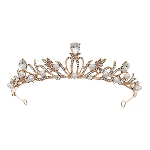 Elegant gold bridal crown featuring white pearls and sparkling rhinestones on white background