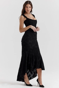 Detail of black mermaid dress featuring intricate 3D jacquard lace texture and wide straps