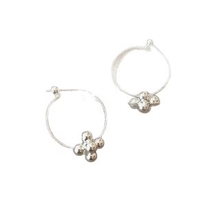 Minimalist silver geometric hoop earrings with polished four-bead star-shaped pendant