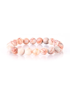 Detailed macro view of 8mm natural stone beaded bracelet with red veined marble texture