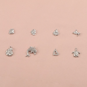 Detailed set of 8 silver stainless steel DIY sea animal and heart shaped jewelry pendants