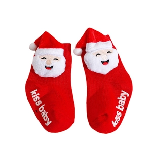 Festive red Christmas baby socks with Santa embroidery and non-slip kiss baby grip soles