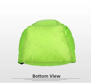 Macro detail of high-visibility neon green ripstop nylon fabric at the backpack bottom