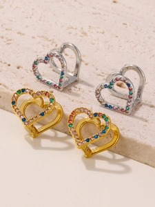 Detailed close-up of double-heart stainless steel earrings with colorful zircon stones
