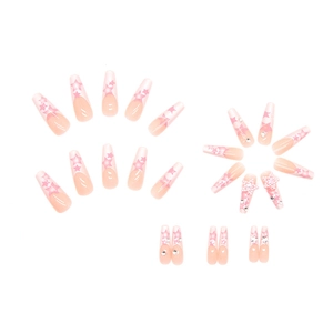 Long ballet press-on nails with pink gradient star patterns and pearl rhinestone accents