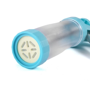 Cookie press gun with clear barrel and teal handle for DIY baking and cream decorating