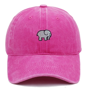 Close-up of gray elephant embroidery on a pink washed cotton vintage baseball cap