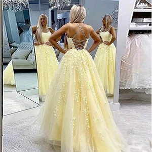 Long yellow tulle prom dress with lace appliques and corset lace-up back design