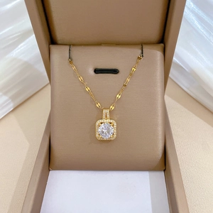 Titanium steel square crystal necklace set featuring a radiant gold finish and halo pendant