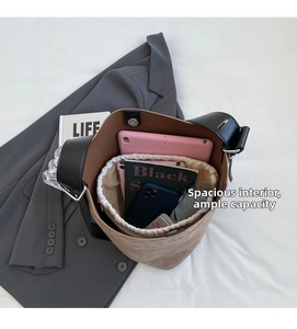 Brown frosted bucket bag showing large capacity for tablet, books and daily essentials