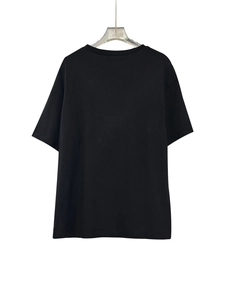 Detailed back view of a slim-fit black cotton t-shirt with soft breathable fabric