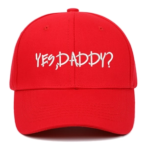 Classic red cotton baseball cap featuring white YES DADDY embroidery and curved brim
