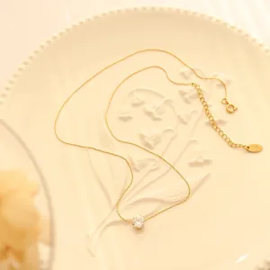 18K gold plated titanium vertical link necklace with a round claw-set zircon pendant