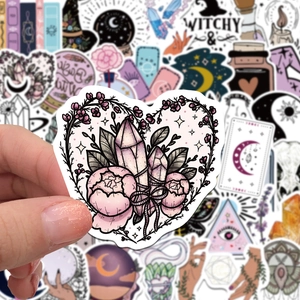 Detailed view of bohemian witch stickers featuring pink heart crystal and tarot designs