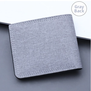 Detailed back view of a slim gray canvas wallet for men with precise contrast stitching