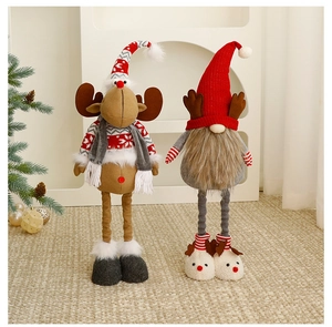 Detail of plush Christmas gnome and reindeer dolls with adjustable long legs