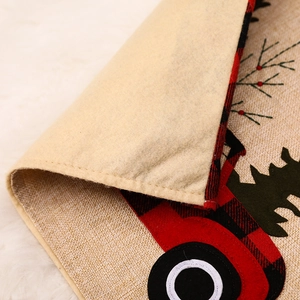 Christmas burlap chair cover with red plaid tractor and tree embroidery detail