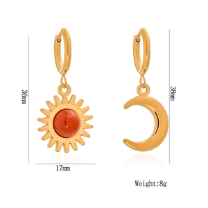 Asymmetric gold sun and moon earrings with red gemstones and size dimensions