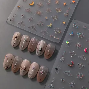 Laser holographic nail art stickers M-164 featuring gold stars, moon, and rose patterns