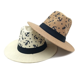 Classic summer straw fedora with anchor print and black ribbon for beach vacations