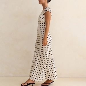 Elegant polka dot satin maxi dress with lace trim and slim fit design for women