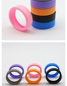 Close-up of colorful thick silicone luggage wheel covers with non-slip texture in various colors
