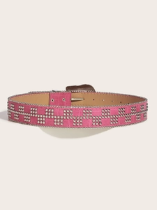 Detail of pink faux crocodile leather belt with metallic studs and silver buckle