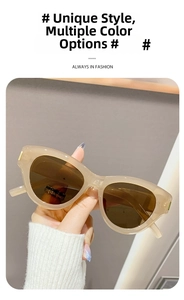 Detail of cream translucent cat eye sunglasses with dark brown lenses for women