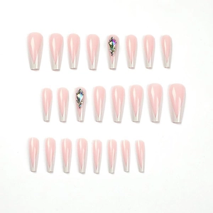 Detailed set of 24 long ballerina press-on nails with French V-tip and rhinestone accents