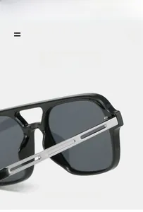 Detail of square pilot sunglasses featuring hollow metal temples and a black frame