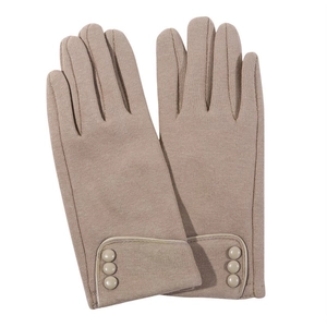 Detail shot of camel fleece gloves featuring decorative buttons and contrast piping finish
