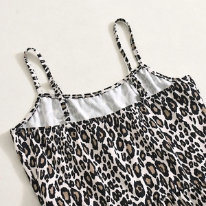 Detail of leopard print camisole featuring thin straps and pleated neckline texture