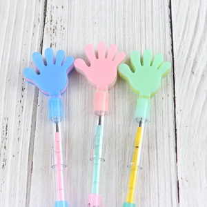 Detail view of colorful palm-shaped stackable pencils for students in various shades