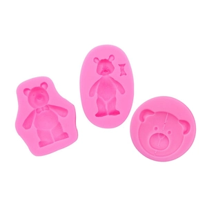 Three bright pink silicone bear molds for DIY cake decorating and chocolate crafting