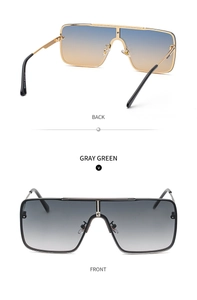 Detail of oversized square sunglasses featuring gradient lenses and metal frames
