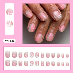 Short round pink aurora gradient press-on nails with white butterfly and star designs