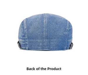 Rear view of washed denim flat cap showing metal buckles and texture detail