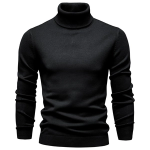 Detail of black turtleneck sweater showing ribbed cuffs and high-quality knit texture
