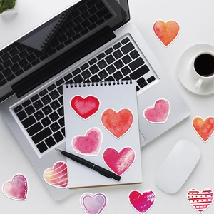 Watercolour heart stickers for laptop and notebook decoration in pink and red tones