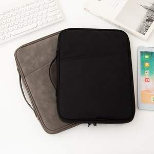 Slim tablet sleeve featuring side handle, dual zippers and front compartment for business use