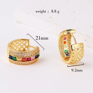 Detail shot of 21mm gold hoop earring with colorful pavé rainbow zircon stones
