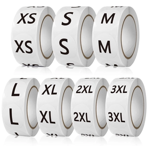 Rolls of 1-inch round size stickers for clothing from XS to 3XL on white background