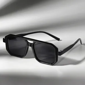 Classic black square double-bridge sunglasses with premium dark lenses in a minimalist style