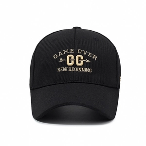 Classic black baseball cap with golden embroidery text in casual street style